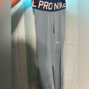 Nike Pro Dri-Fit Women’s Size XS mid-rise Leggings Sea Blue
